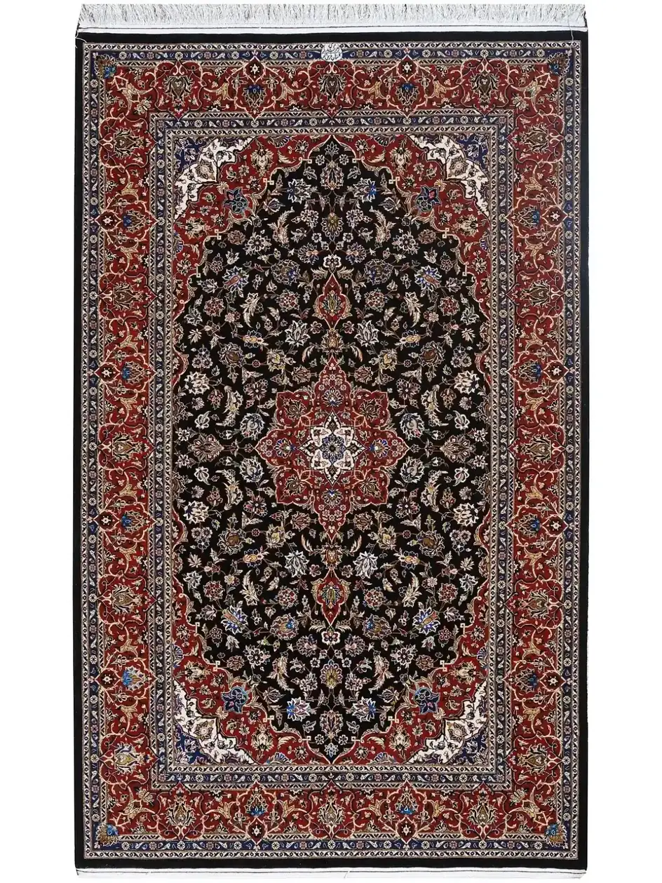 Full view of Persian Lachak Toranj handmade Kashan rug with dark field, red medallion and floral red border