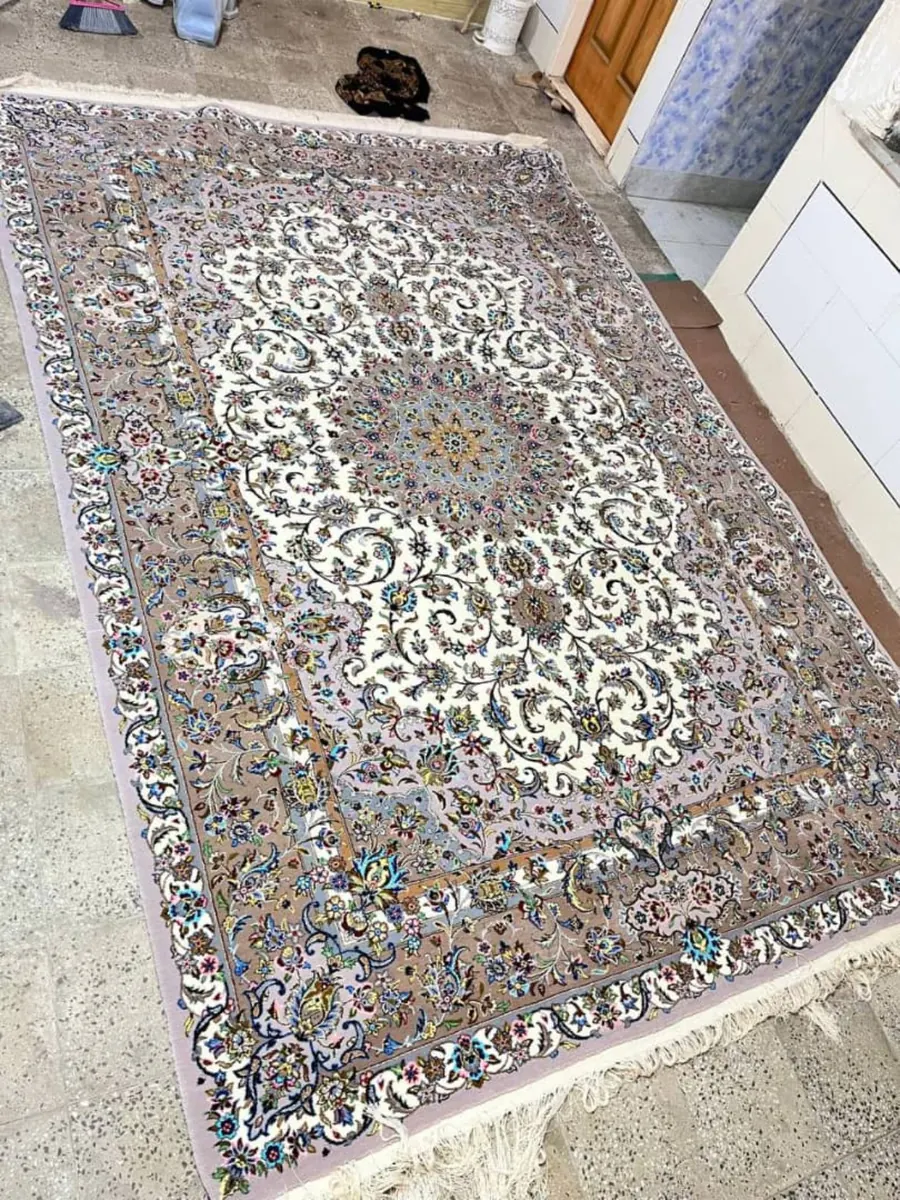 Verified overhead full view of Sacred Lachak Toranj handmade Kashan carpet with ivory field and taupe medallion