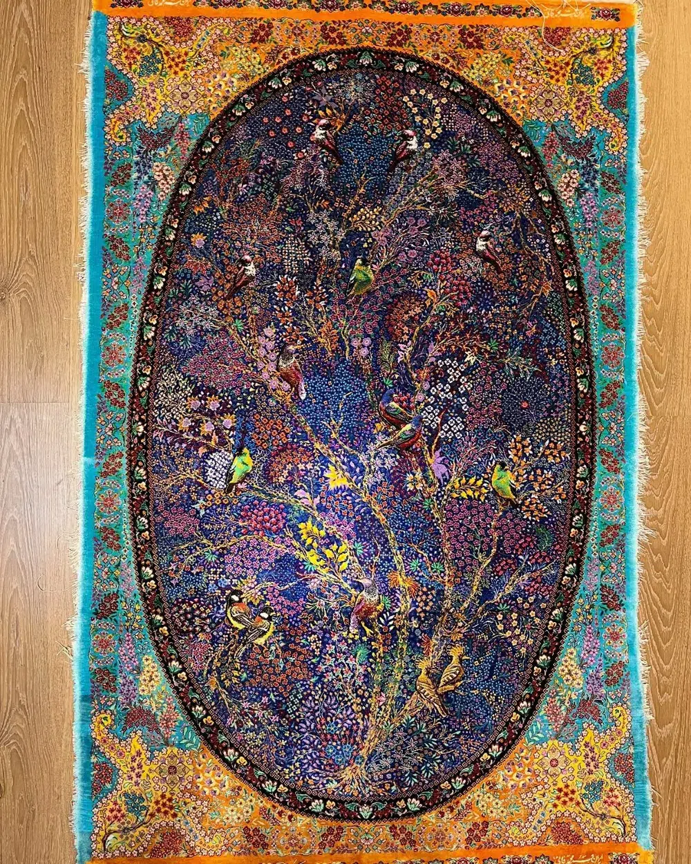 Royal Aviary of Paradise handmade Qom pure silk carpet featuring the Persian Tree of Life with colourful birds