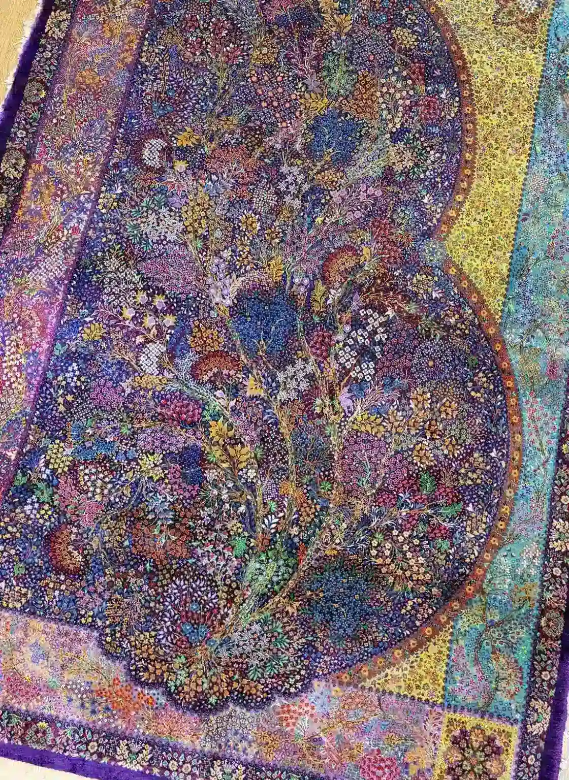 Violet Garden Tapestry handmade Qom pure silk carpet with a flowering Tree of Life and multicolour patchwork border