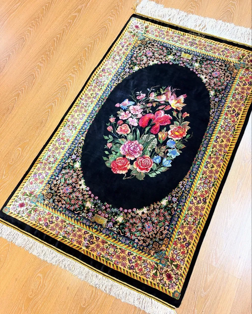 Midnight Bouquet of Birds handmade Qom pure silk carpet with Gol Farang flowers and colourful birds on a black field — detail 1