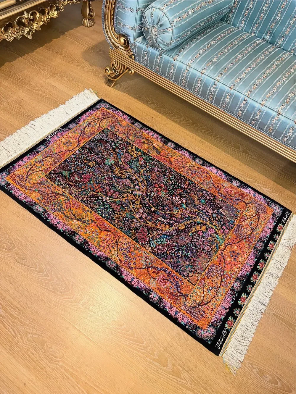 Amber Tree of Blossoms handmade Qom pure silk carpet with a flowering Tree of Life and warm amber garden border