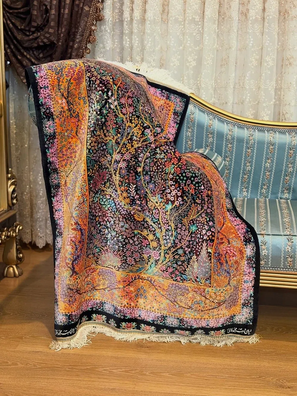 Amber Tree of Blossoms handmade Qom pure silk carpet with a flowering Tree of Life and warm amber garden border — detail 1