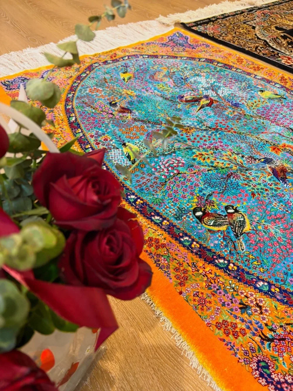 Turquoise Aviary of Dawn handmade Qom pure silk carpet with songbirds, flowering branches and an oval turquoise garden field — detail 1