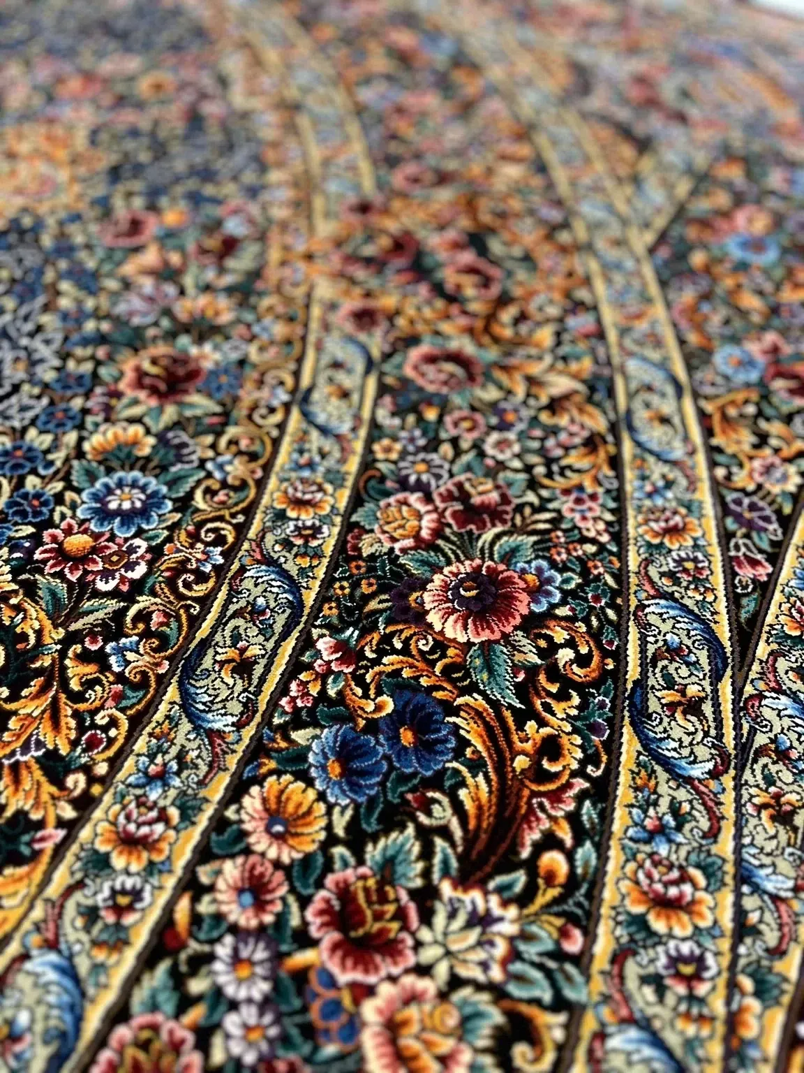 Imperial Floral Colonnade handmade Qom pure silk carpet featuring rhythmic vertical floral panels filled with roses, palmettes and flowing arabesques in jewel-toned silk