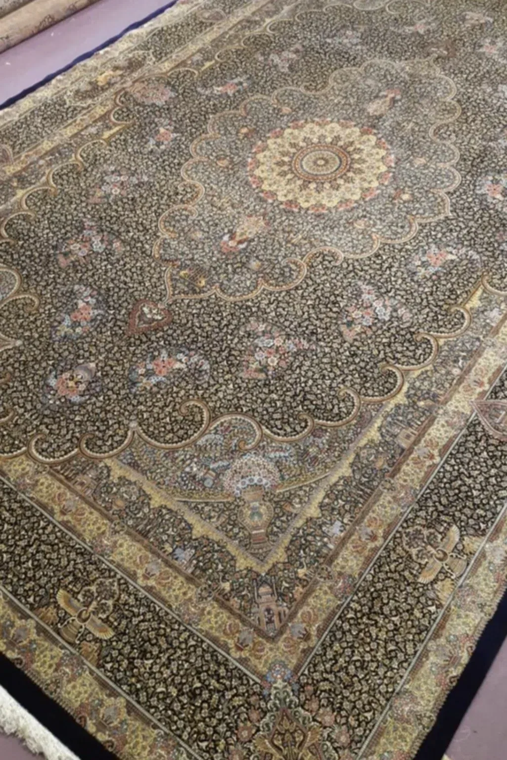 Midnight Palace Rosette handmade Qom pure silk carpet featuring a grand scalloped rosette surrounded by miniature palace and garden details