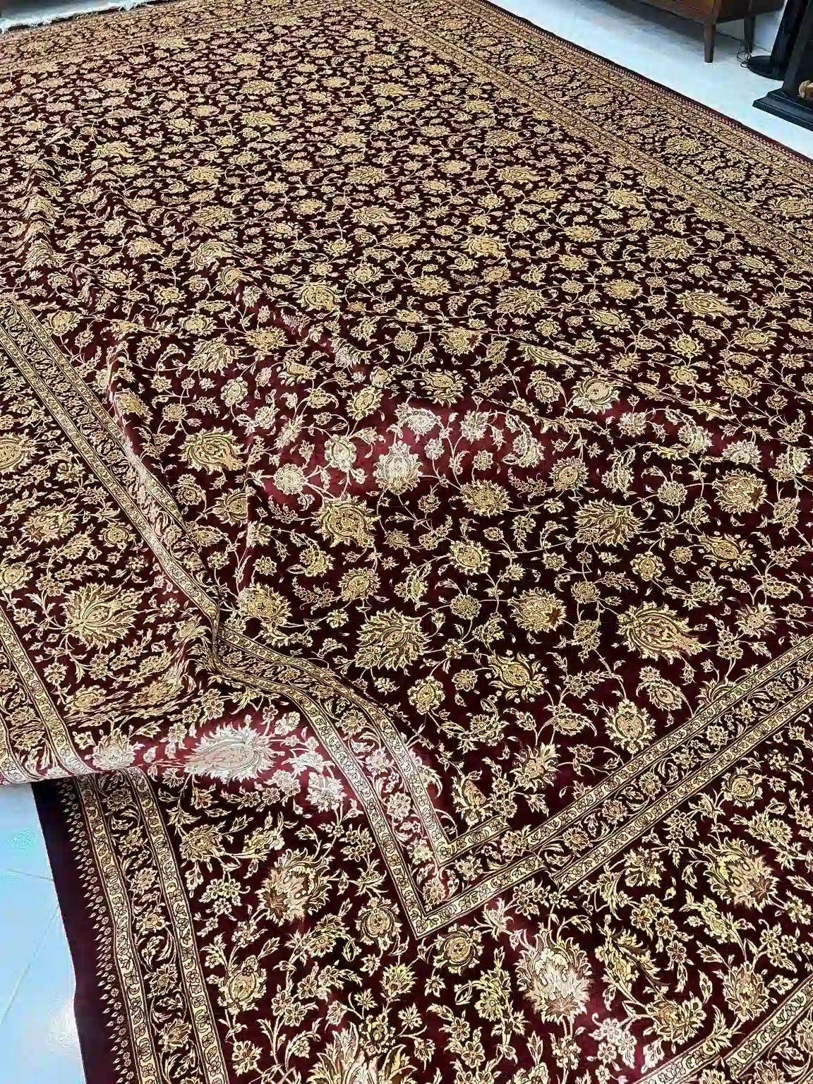 Crimson Shah Abbasi Garden handmade Qom pure silk carpet featuring an immense all-over field of Shah Abbasi blossoms and refined scrolling arabesques